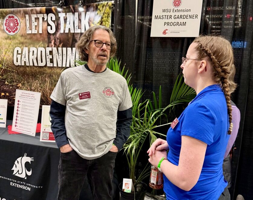 Master Gardeners Phil and Christine traveled to Seattle to volunteer in the state booth at the NW Flower & Garden Show!