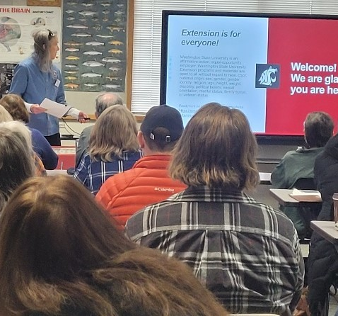 Two master gardeners talking about plants.