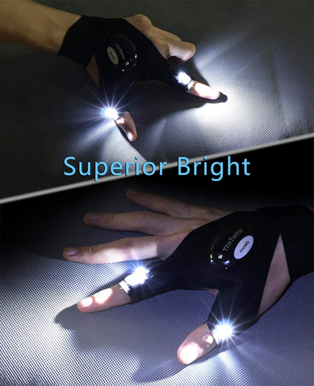 hand wearing glove with finger lights