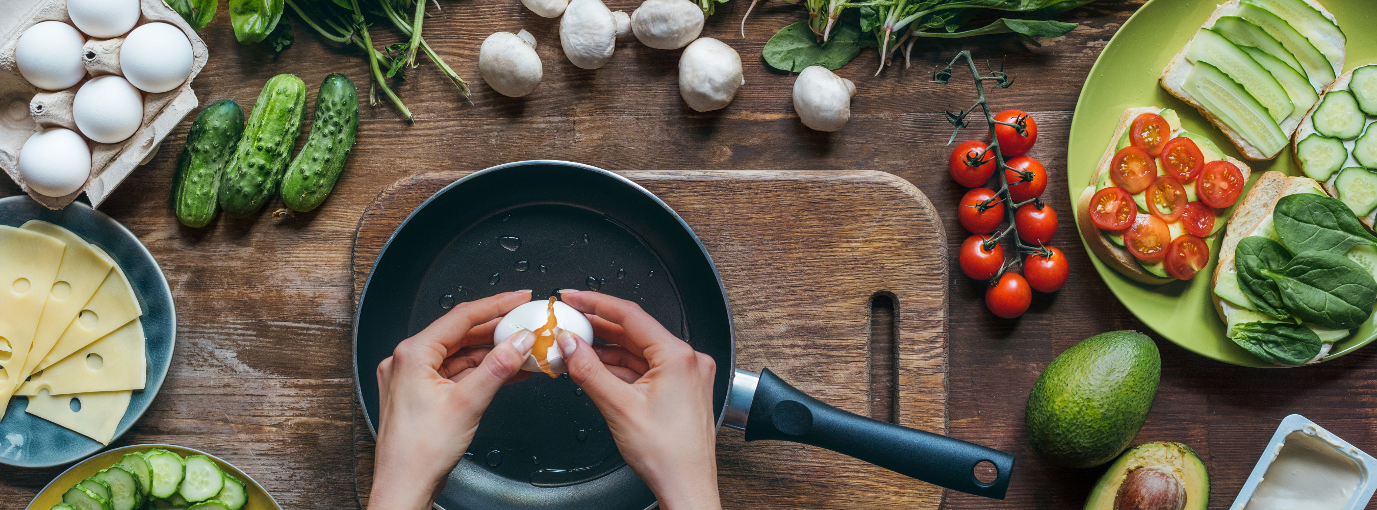 Home cooking example with countertop and fresh vegetables.