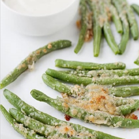 Breaded green beans with a dipping cup