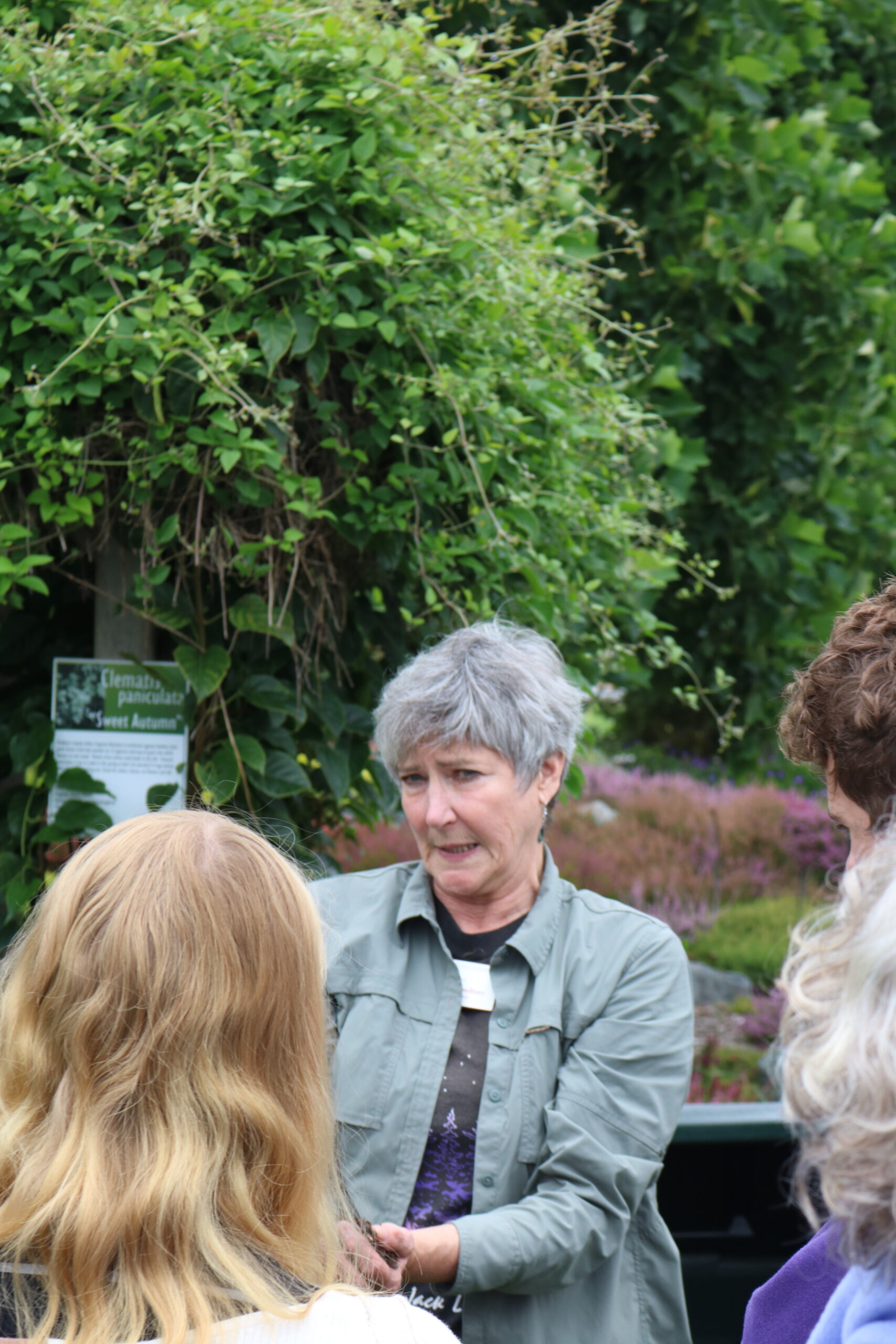 Master Gardener explains compost at the discovery garden
