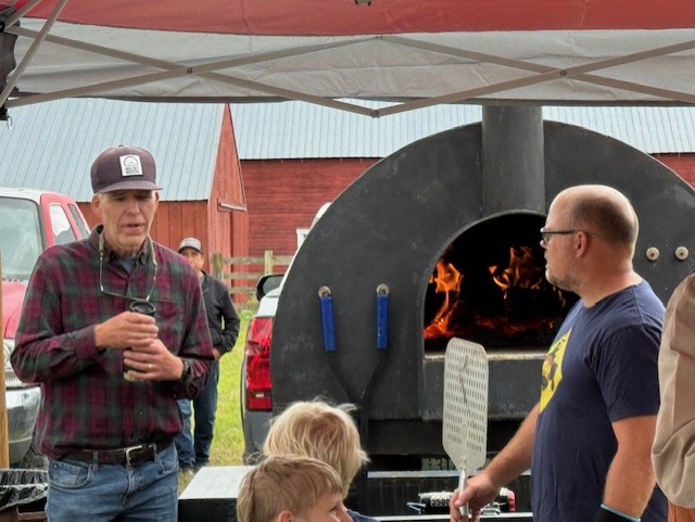 Pizza for Producers event interaction with farmer