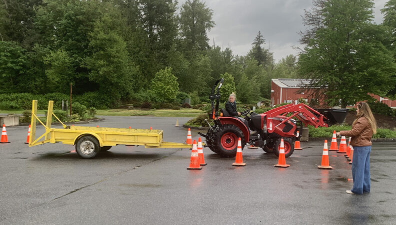 Gearing Up for Safety participant backs their tractor during skills testing