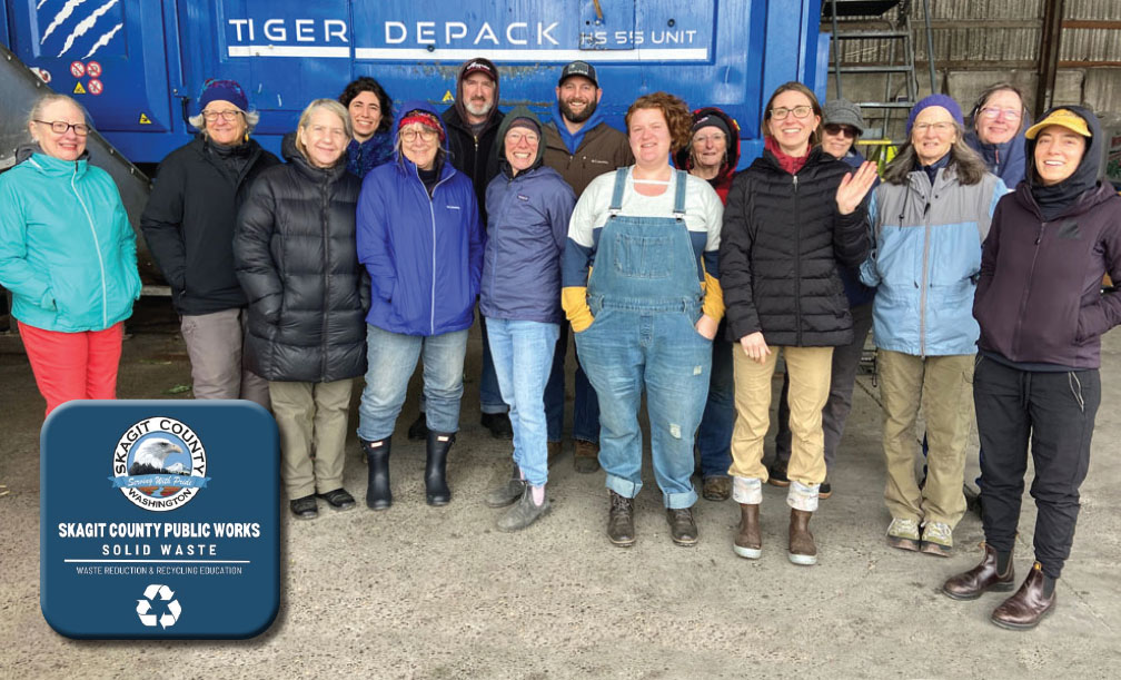 Volunteers standing near the SkagitCounty Public Works Solid Waste compost bin