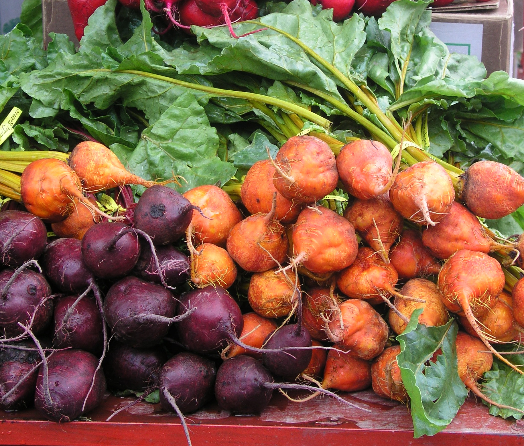 Stacks of purple and orange beets