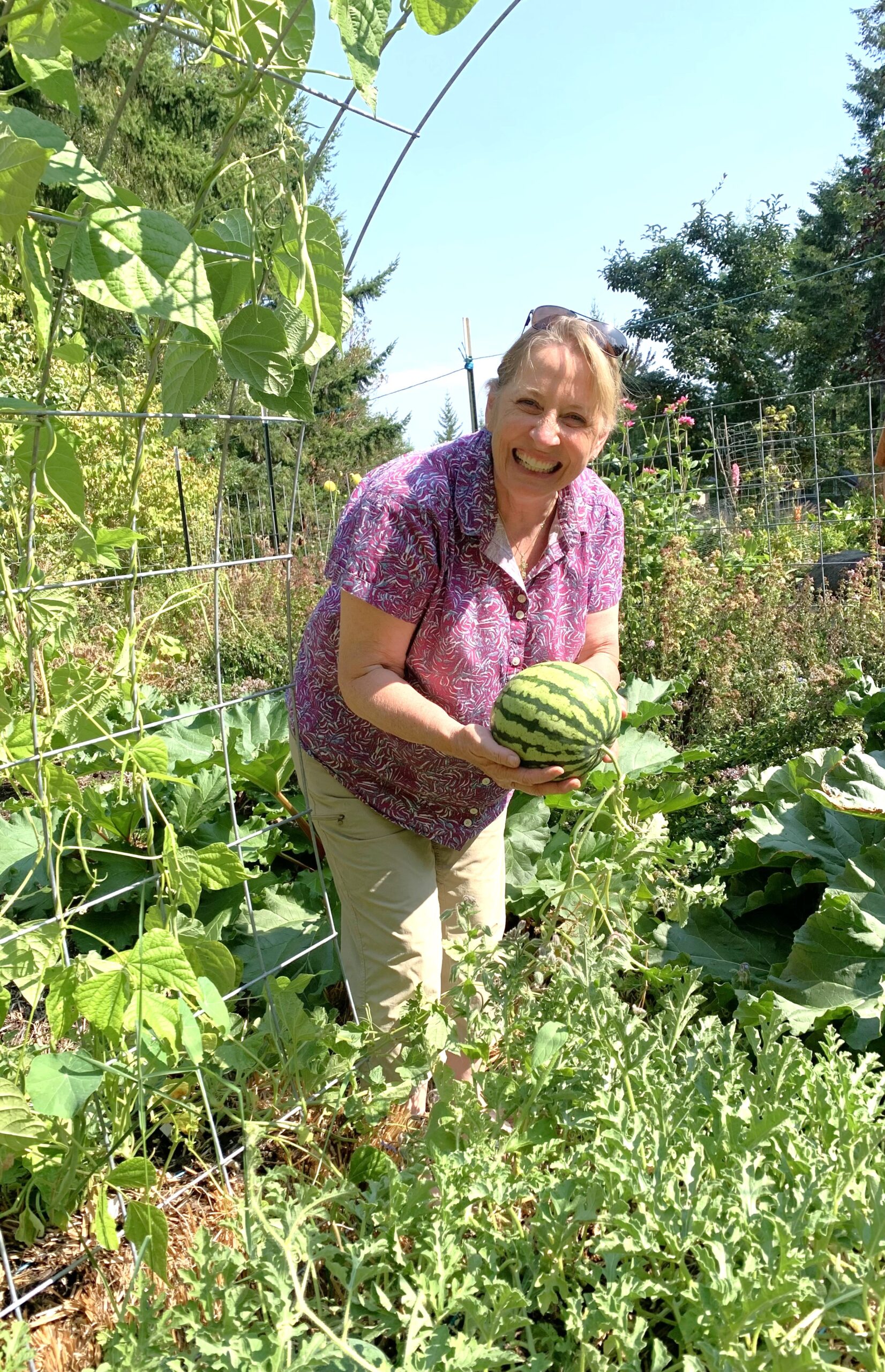 Woman holding a watermelon grown in Jefferson County