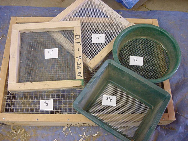 Five garden screens with different hole sizes are labeled with the corresponding dimension, beginning with the smallest hole at one-eighth inch and the largest at one-half inch.