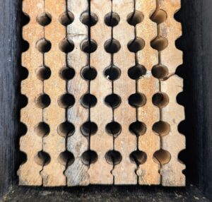 Wooden, maintainable nesting block for blue orchard mason bees (Osmia lignaria).