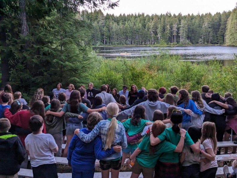 4-H Campers singing camp songs by Panhandle Lake.