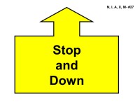 A large yellow shape outlined in black resembles a wide arrow with a flat top and extended sides. Centered inside the shape, bold black text reads “Stop and Down.”