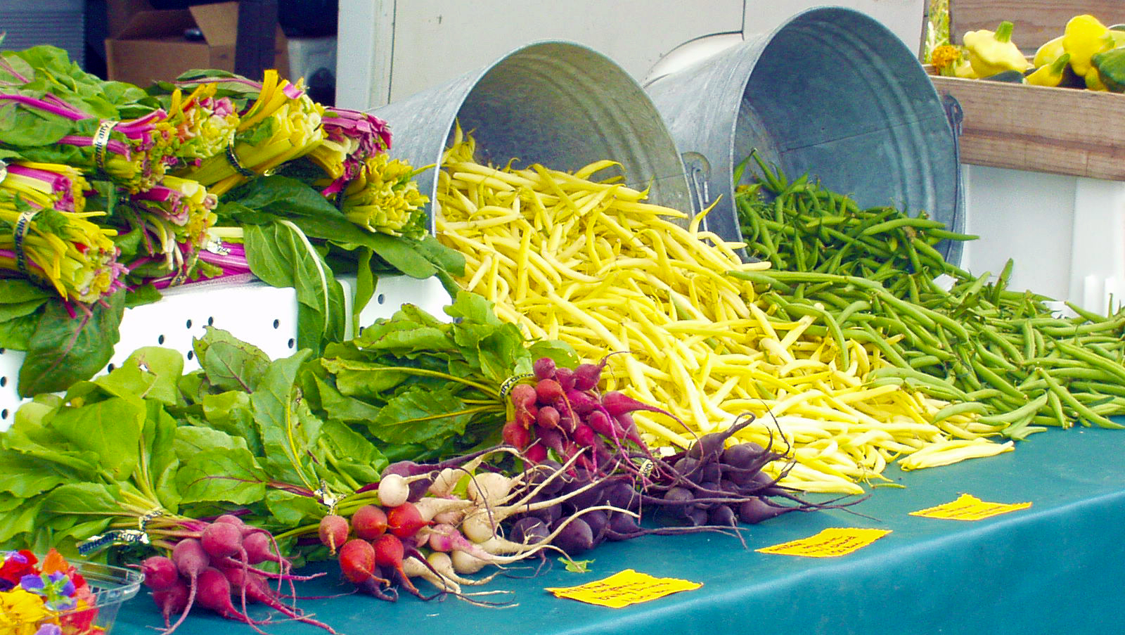 Farmers market table with vegetables