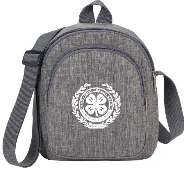 Mini cross-body sling with fancy 4-H emblem. Head, heart, health, hands. To make the best better. Since 1902.