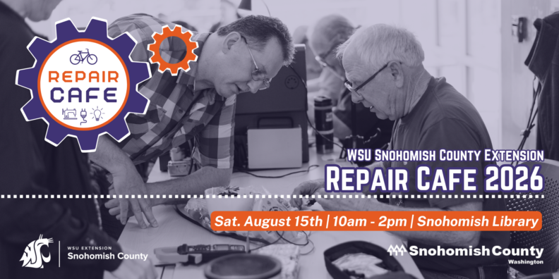 Repair Cafe banner with event information and a photo of two male volunteers repairing an item on a table.