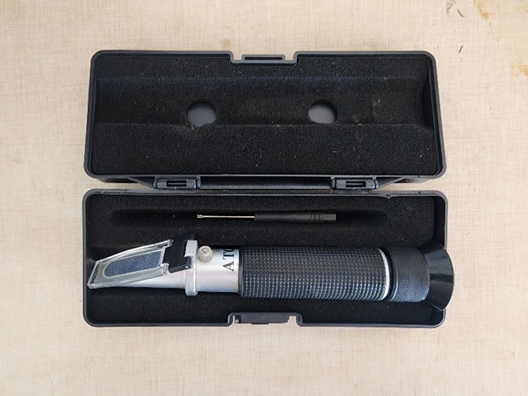 A manual refractometer for testing sugar content of sap.