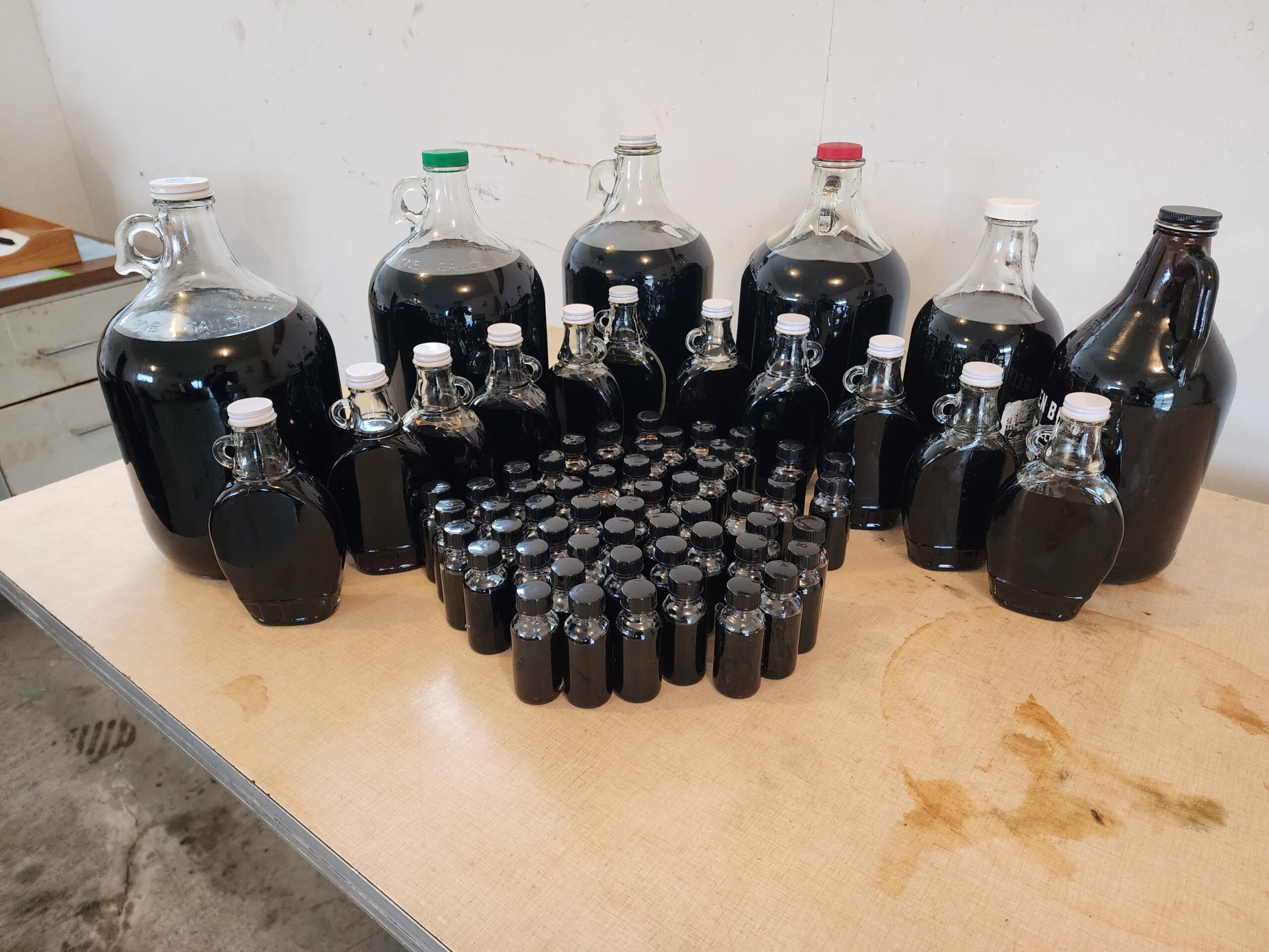 Bigleaf maple syrup in various sized containers