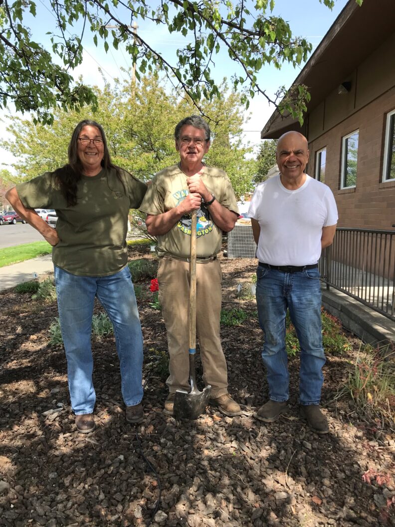 Three Master Gardeners posing in the garden