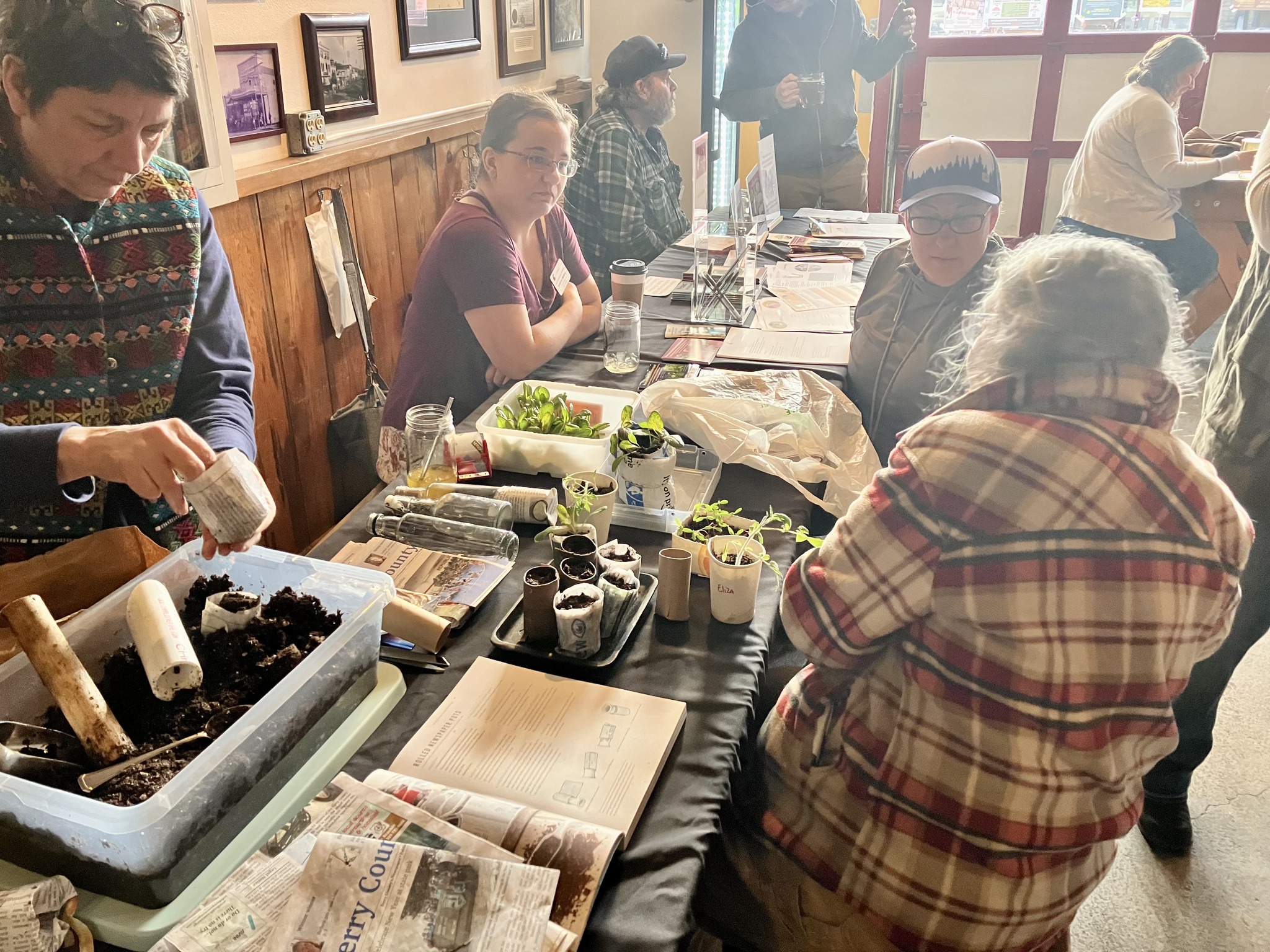 Master Gardeners providing gardening education to community members.