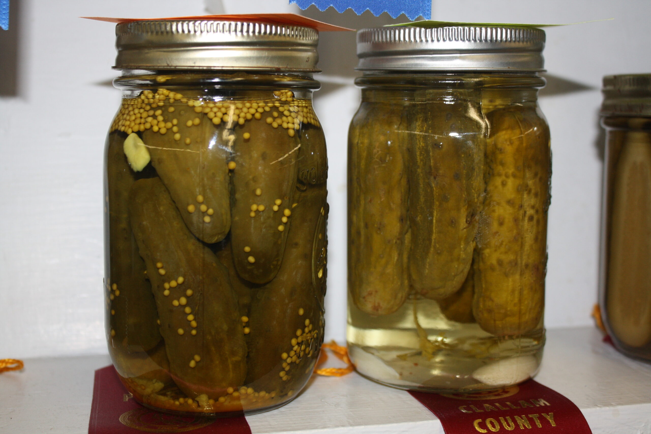 Canned pickles at display at the county fair.