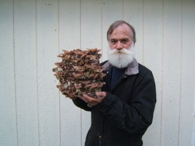 Lowell Dietz holding a mushroom