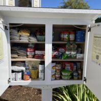 Stocked pantry with doors open