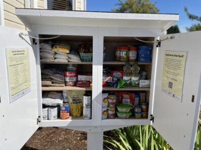 Stocked pantry with doors open