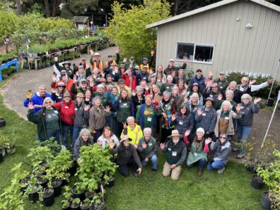 a group of people pose for a picture.