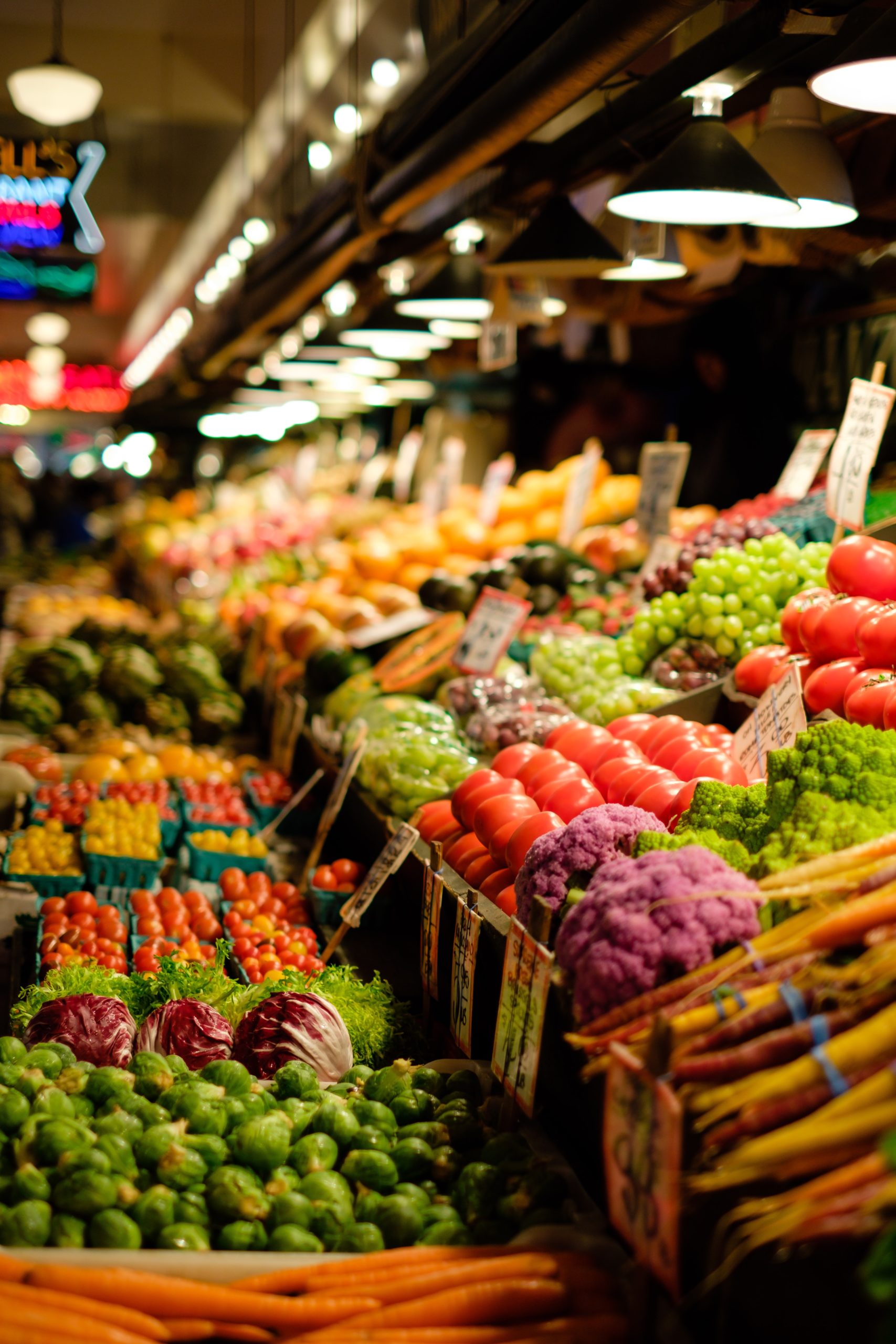 Variety of fruits and vegetables in a store.