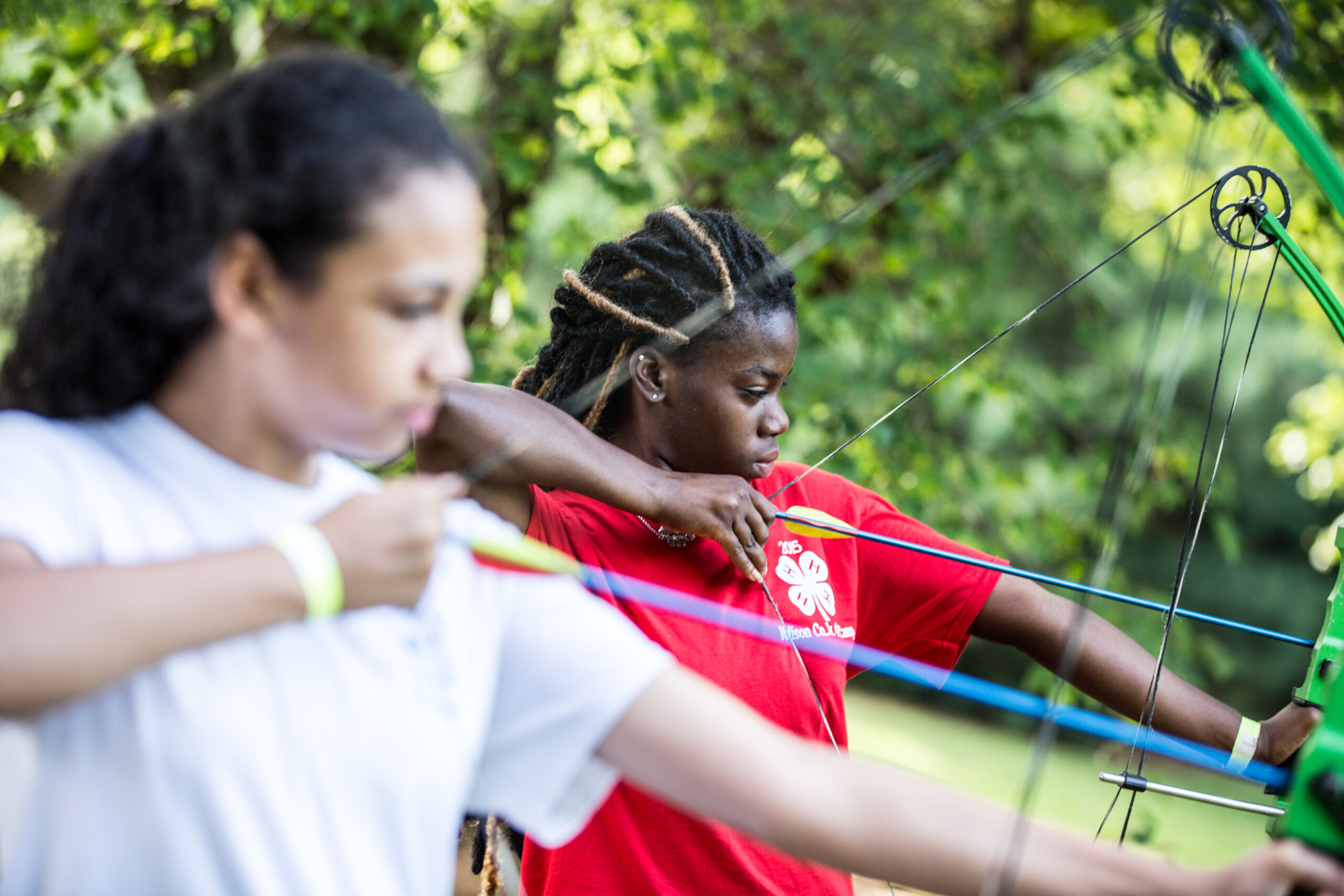 Girls Shooting Arrows