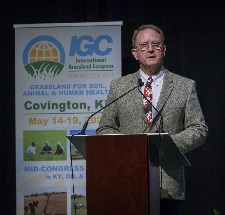 Peter Ballerstedt speaking at a podium.