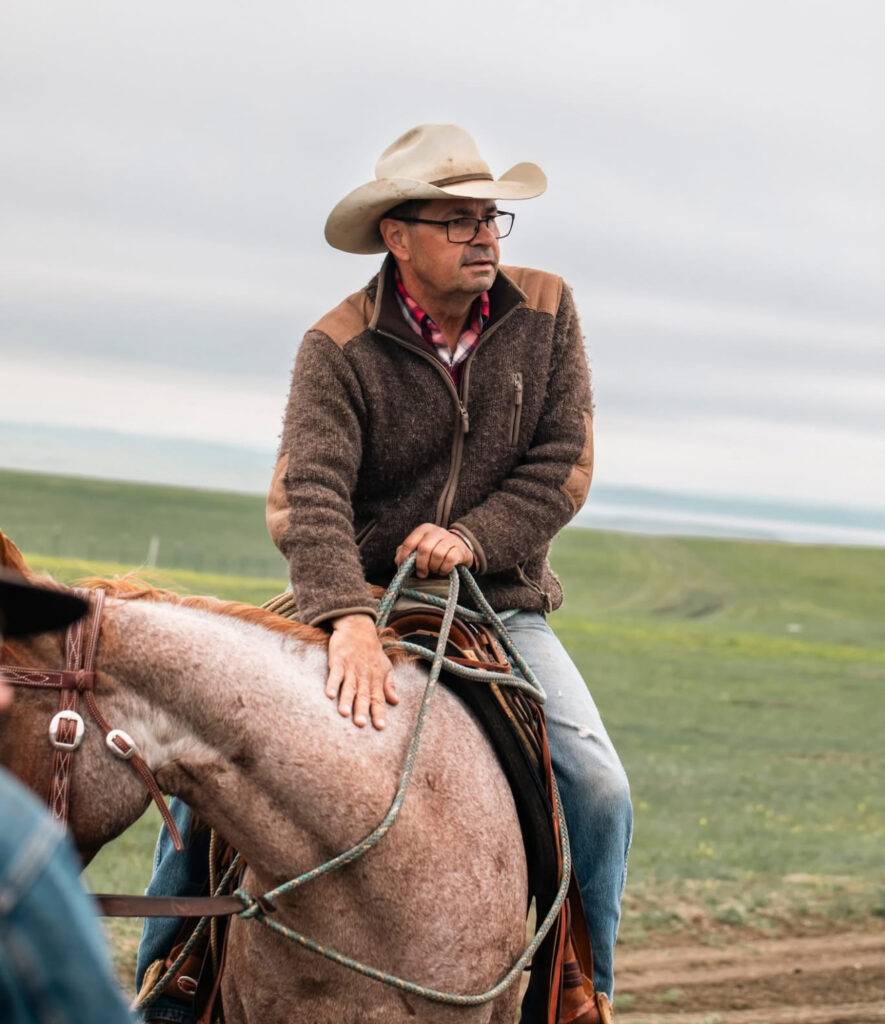 Zach Ducheneaux on a horse.