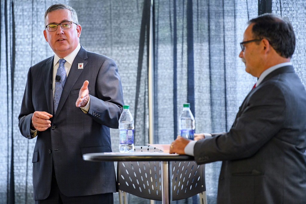 Schulz and Bernardo on stage speaking during a 2018 Town Hall session.
