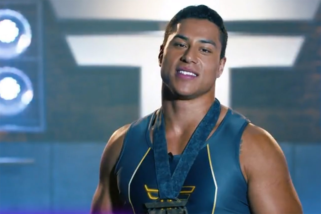 Buckley on set wearing Titan ribbon and medal.