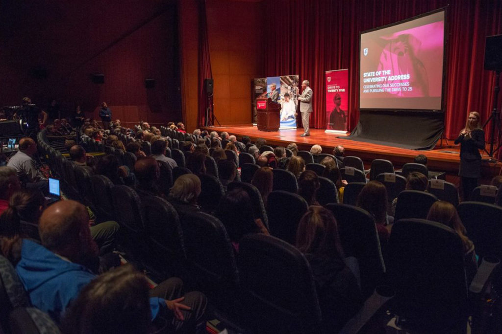 WSU community listening to Kirk Schulz during State of the University address.