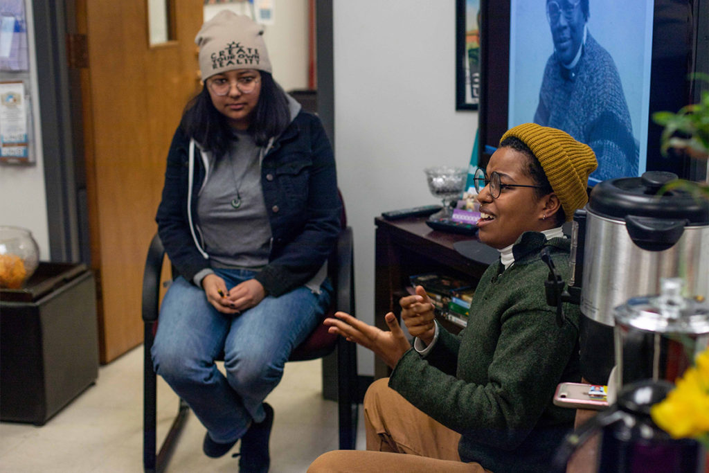 Students conversing in the WSU Women’s Center.