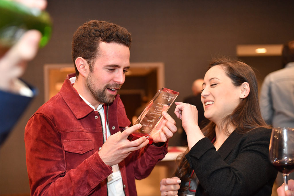 A photo of Steven Hobaica and Anne Fuller with a trophy
