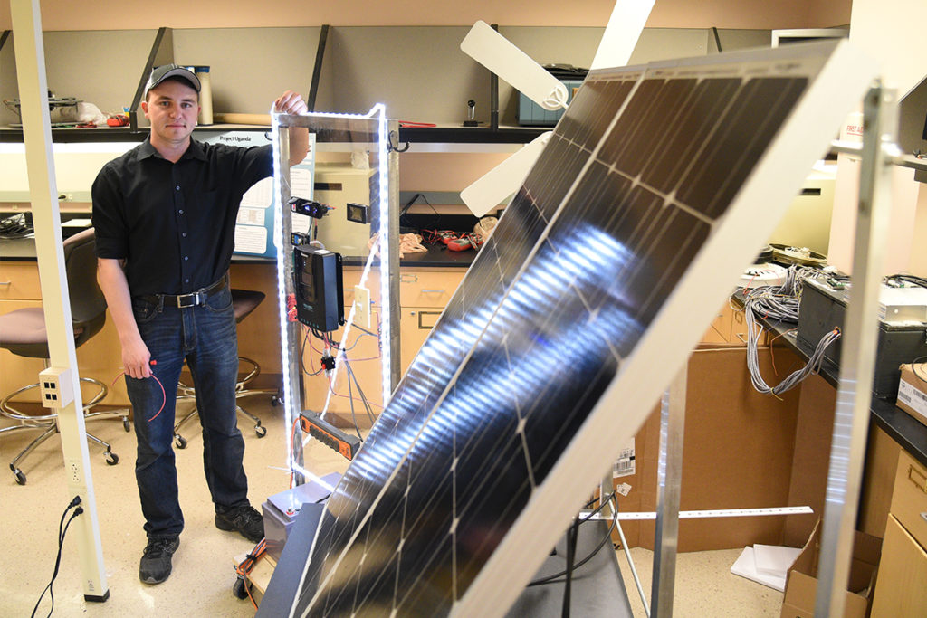 Arthur Baranovskiy working in a laboratory at WSU Tri-Cities.