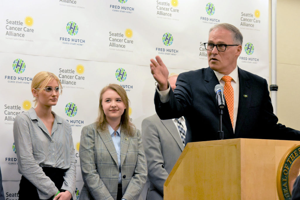 Gov. Inslee speaking at the Fred Hutchinson Cancer Research Center.