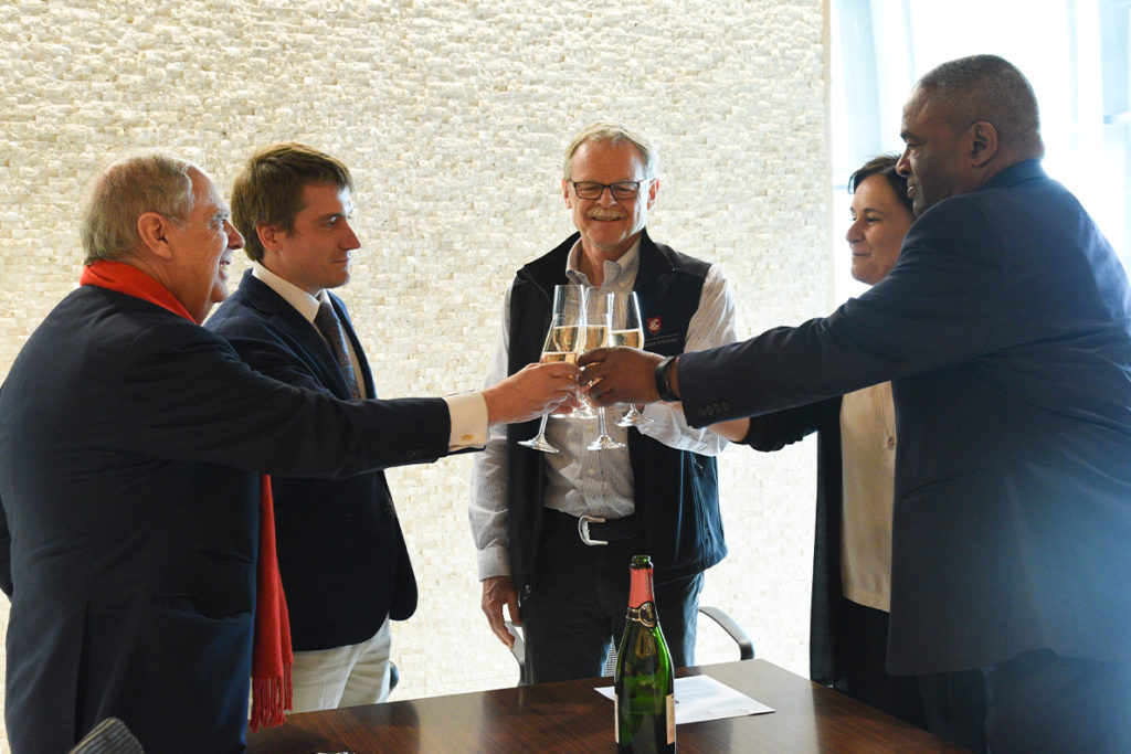 Members of the WSU community and Valdemar Family Wine celebrate a new agreement between the two entities.