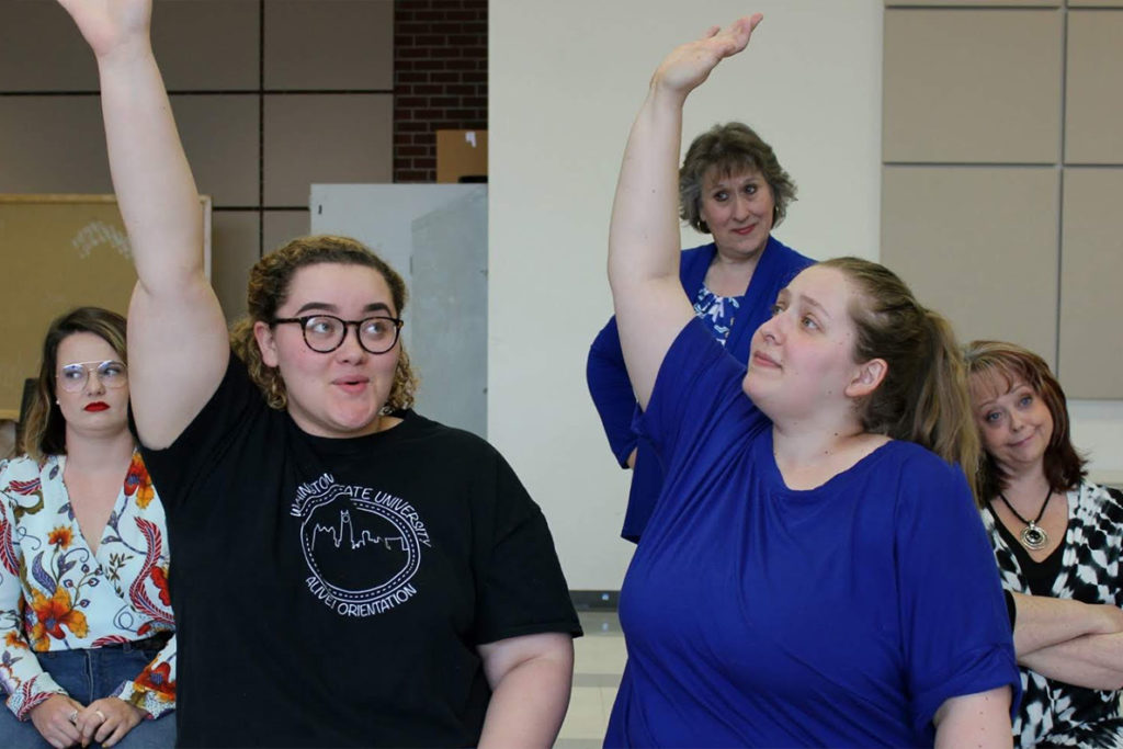 Women performing an opera.