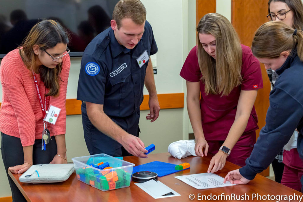 Students work together during an event.