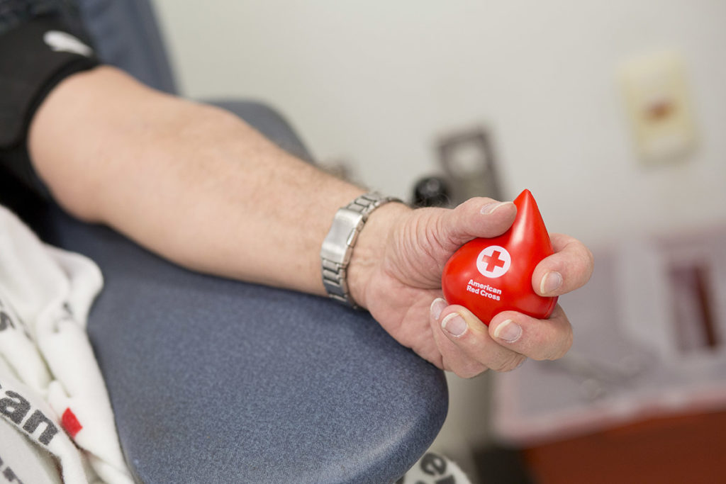 hand of a blood donor holding a stress ball