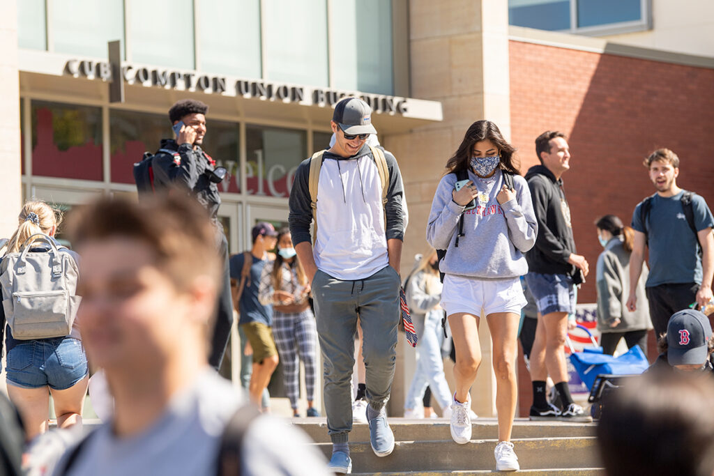 WSU Pullman students walking outside of the Compton Union Building.