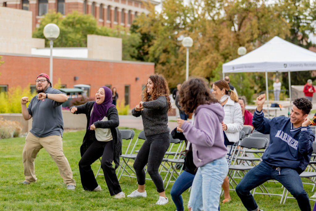 Students participate in a dance program at the Latinx Heritage Month kickoff event in 2019.