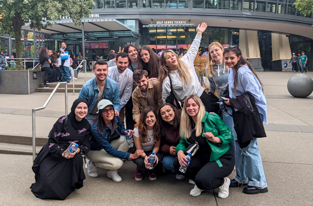 Closeup of SUSI students in front of the Space Needle.