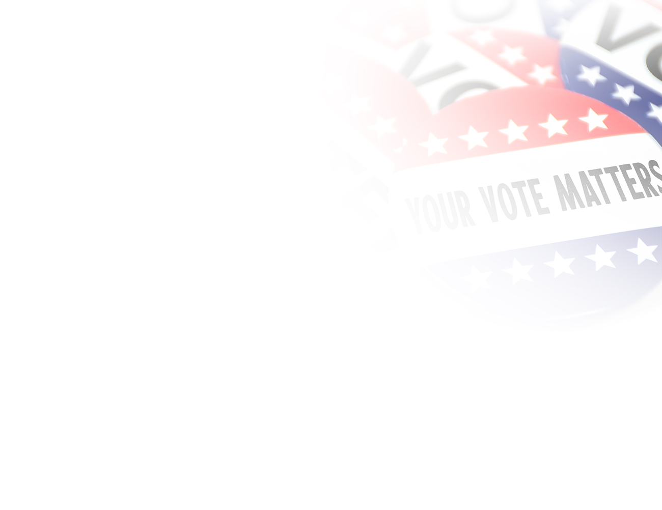 A collection of pins that read "Vote" and "Your Vote Matters".