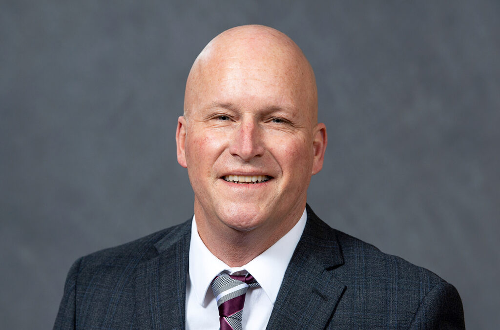 Dave Cillay in a suit and tie.