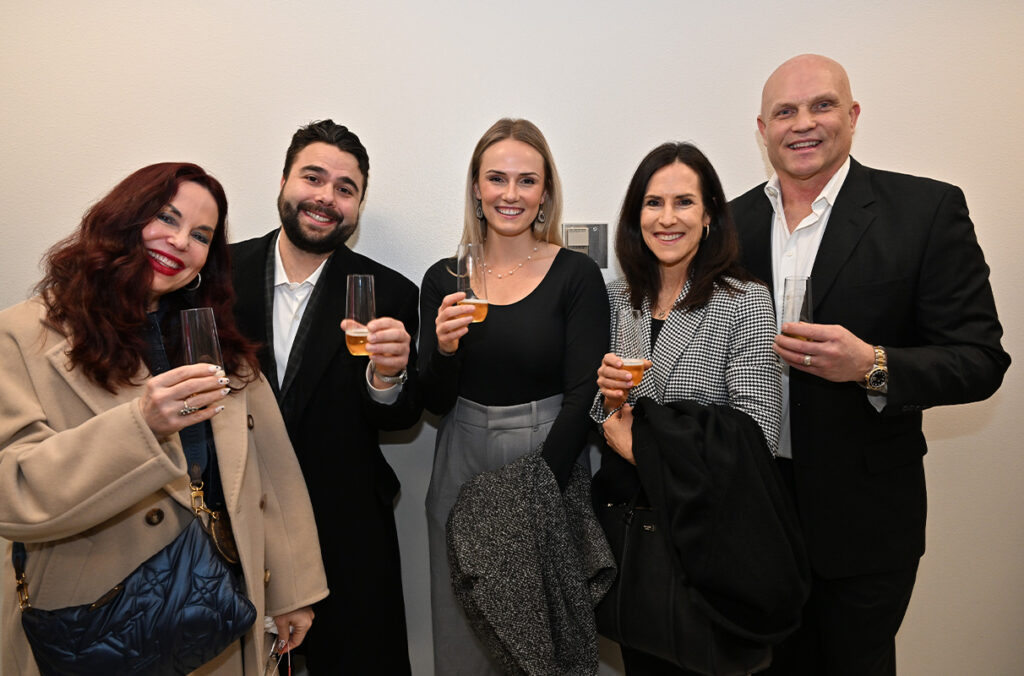 Closeup of Jerry Burtenshaw's family during the conference room naming ceremony.