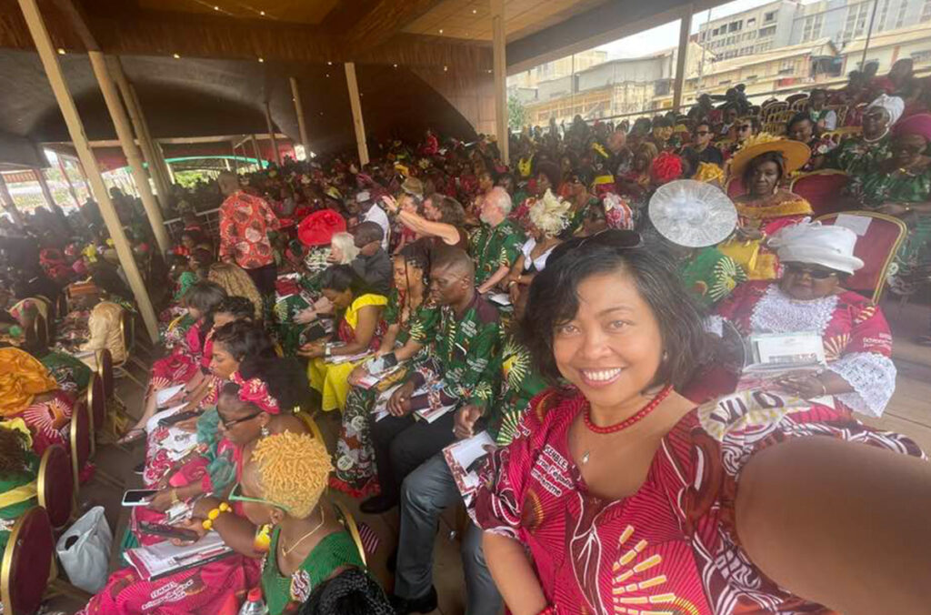 Luna Magapili poses for a photo with engineering management students.
