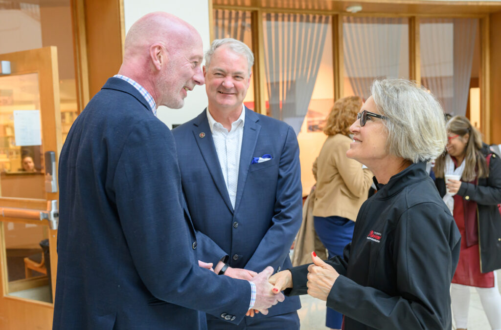 WSU President Elizabeth Cantwell visiting with university employees.